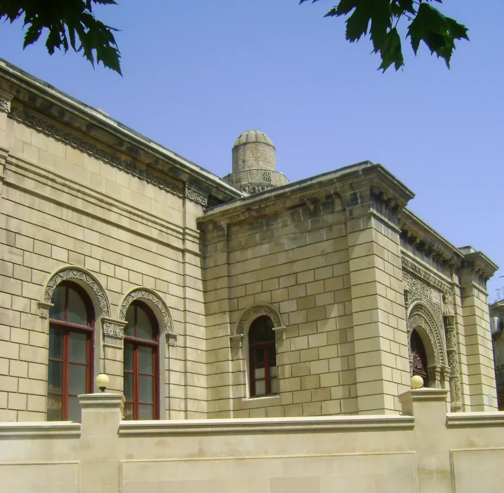 Stone facade and tower of the Juma Mosque in the Old City of Baku