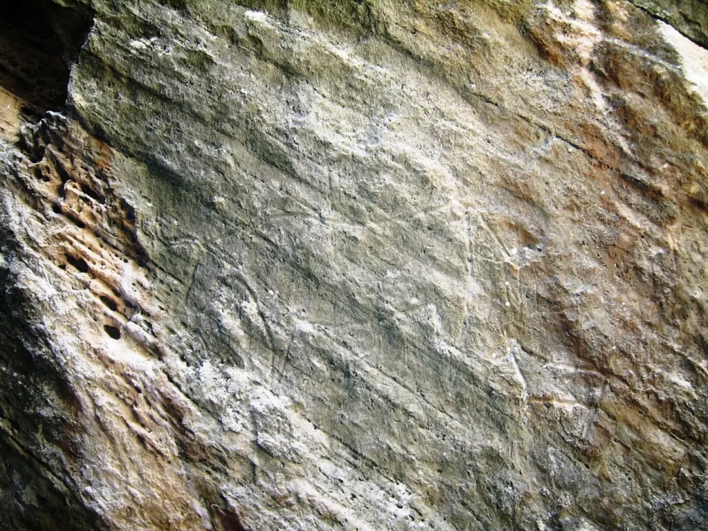 Layered rock face at Gobustan, where the prehistoric petroglyphs are carved