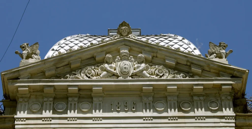 Carved pediment dated 1896 on a building in Nizami Street, Baku