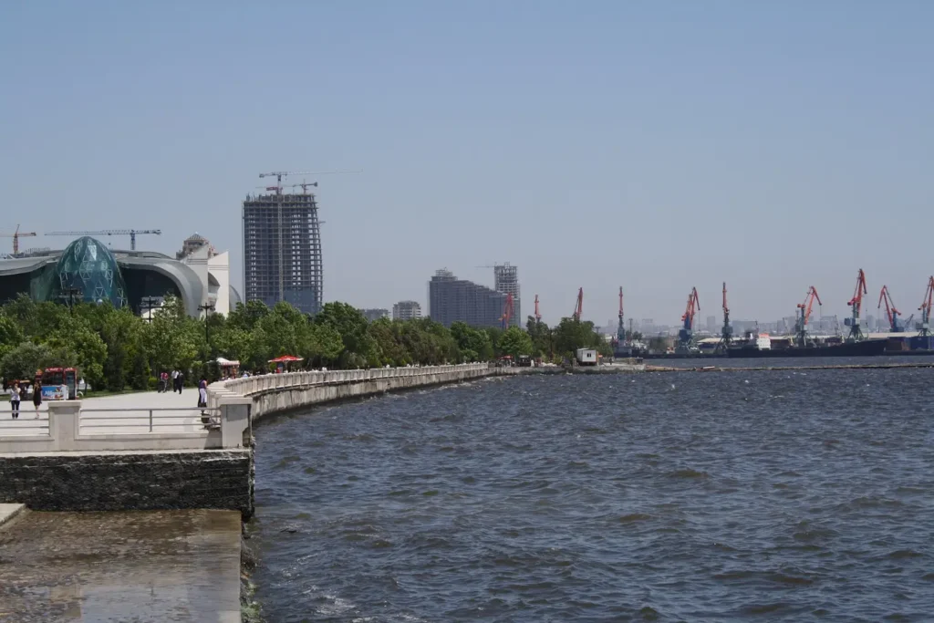 The Baku seafront walkway with the port cranes beyond
