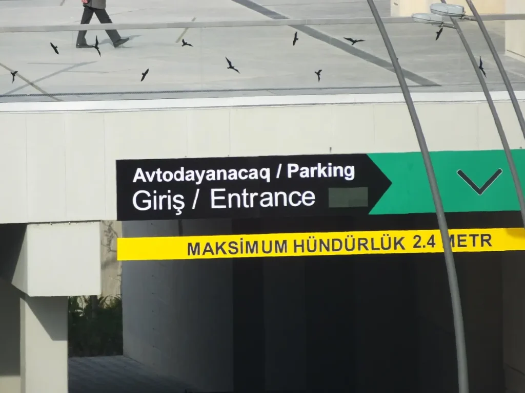 The entrance sign to an underground car park in Baku