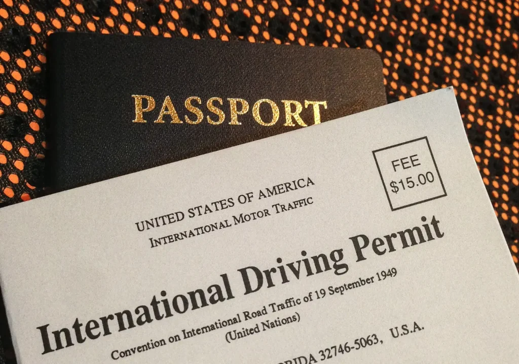 An International Driving Permit lying on a passport
